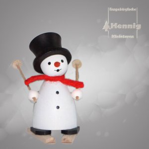 Schneemann mit Ski